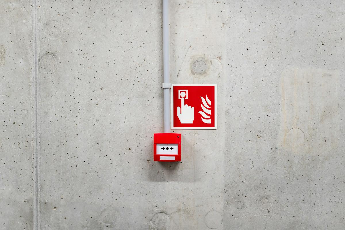 Manual call point and fire action sign
